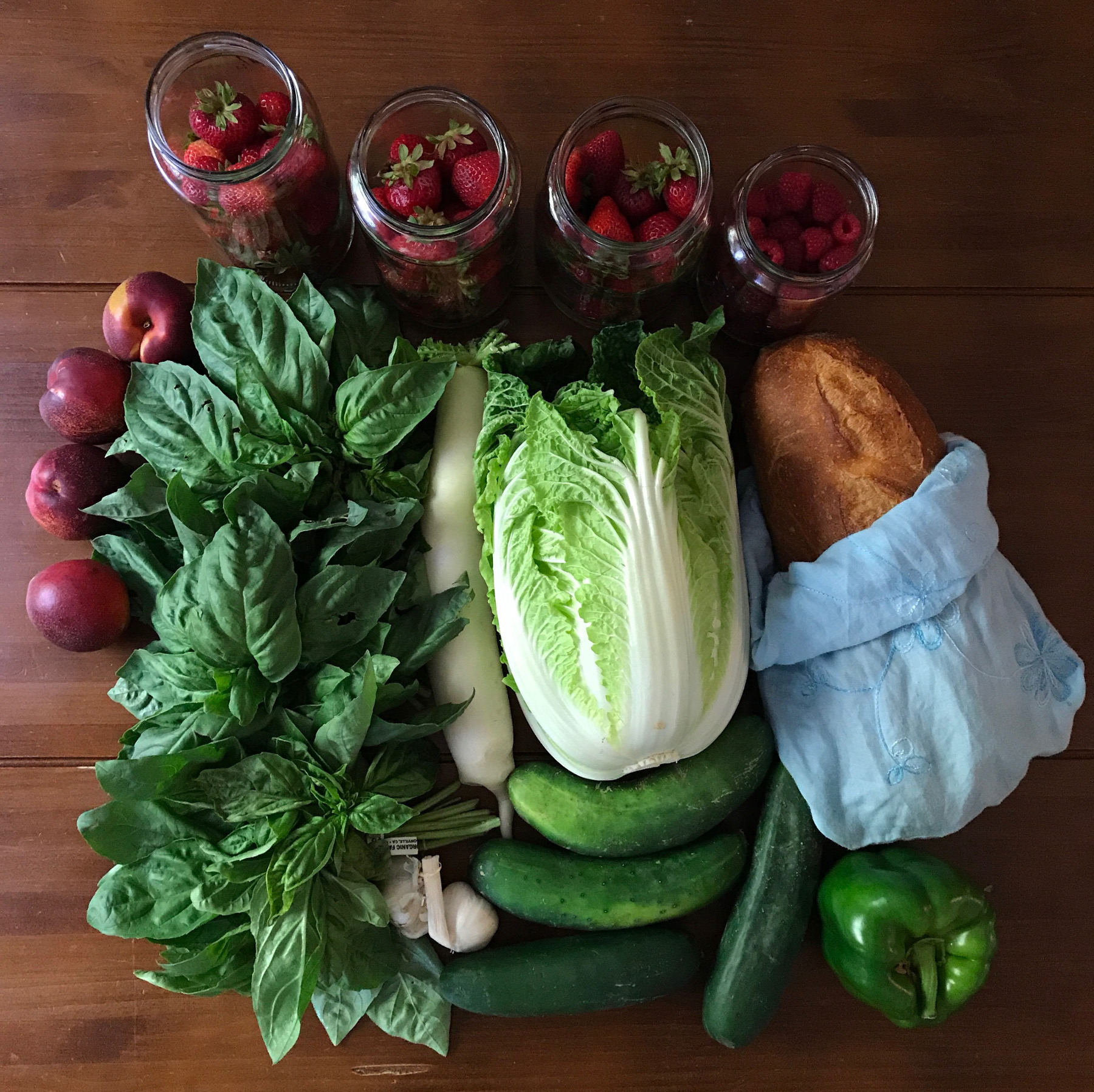 fresh produce sitting on a dark wooden background
