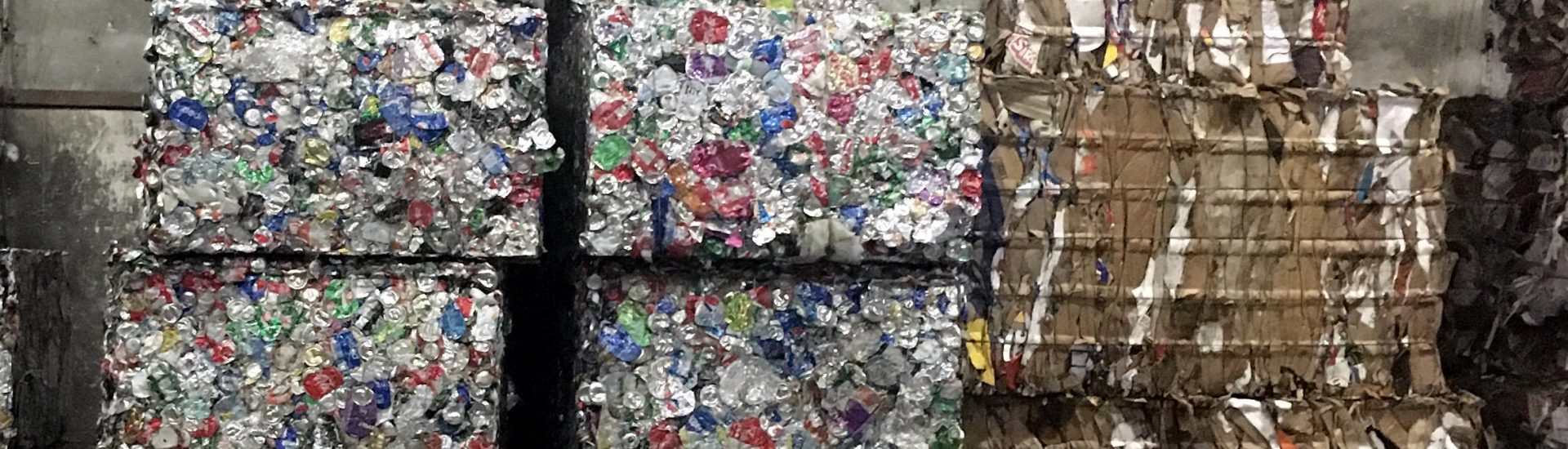 Metal and cardboard bales ready for recycling