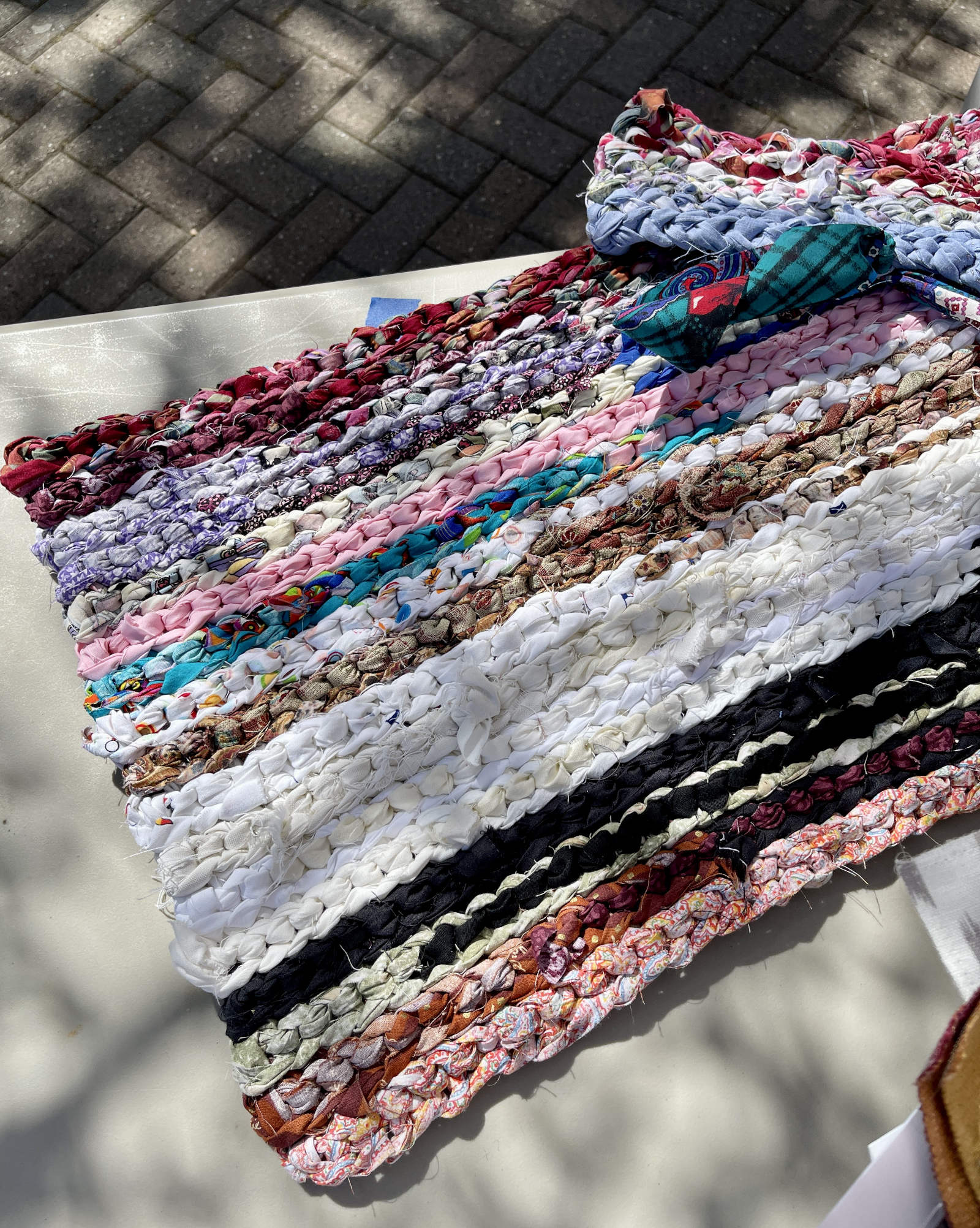 Multi-colored rag rug made of fabric scraps