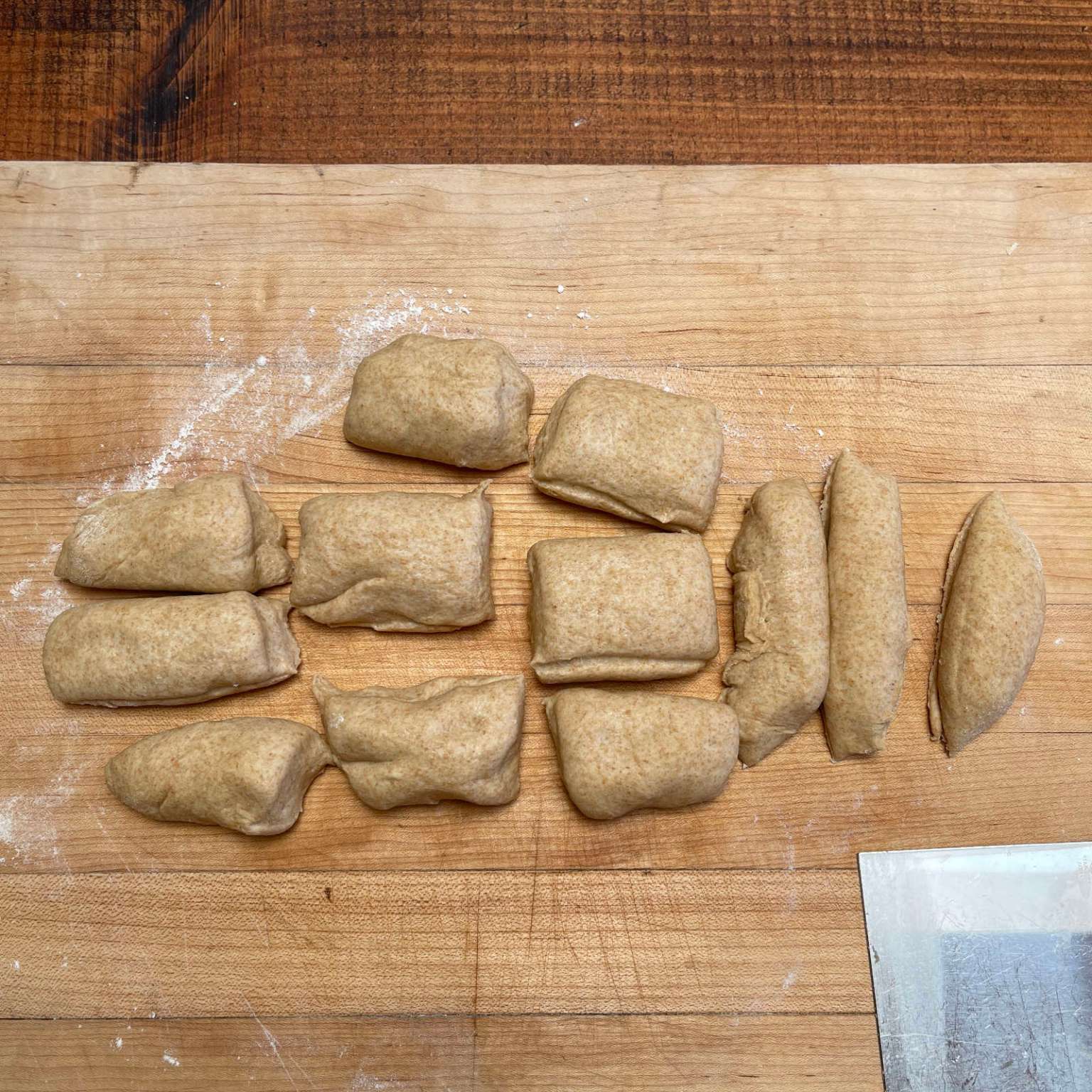 Dough has been cut into 12 pieces to make tortillas