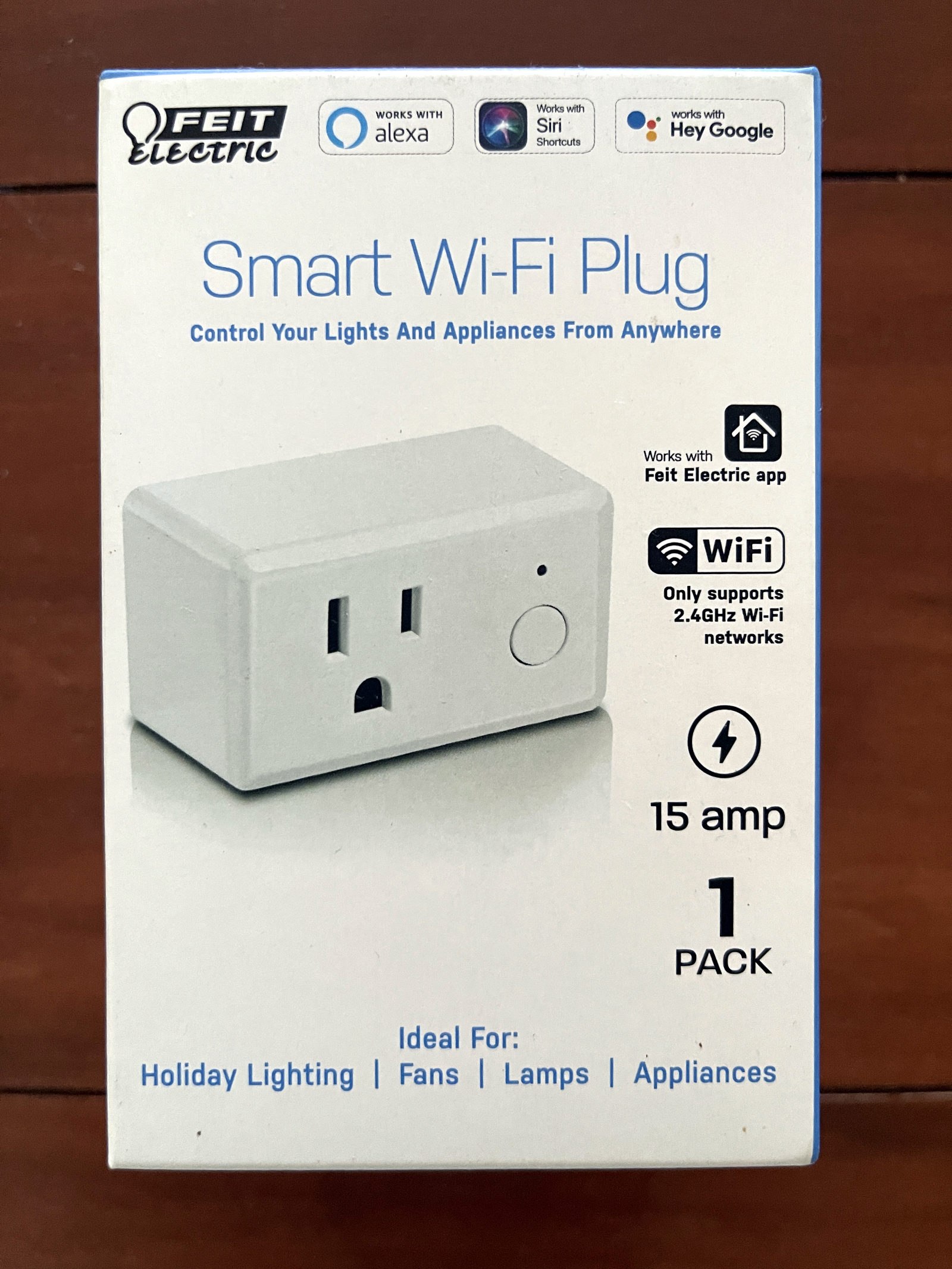 A box containing a white smart Wi-Fi plug